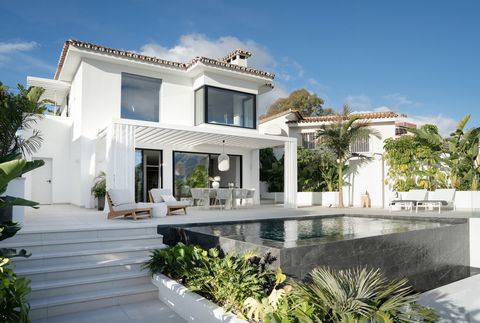 Discover the epitome of luxurious living in the prestigious La Alqueria urbanization, nestled within the charming municipality of Benahavis. This fully furnished detached villa is a true masterpiece of contemporary design and offers an exceptional li...