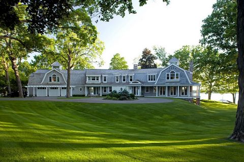 Landmark Lake Minnetonka estate overlooking 350' of southwest facing shoreline at the end of sought-after Bohns Point! This 2.88 acre property is the perfect combination of privacy and unparalleled lakeshore, complete with guest cottage. Enjoy timele...