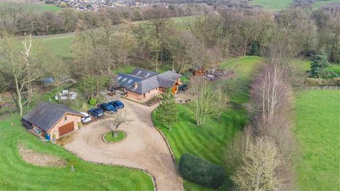 A bespoke home, privately enclosed within 7 acre grounds, commanding breathtaking views over south facing gardens, occupying the most idyllic of settings, offering spacious accommodation, incorporating 5 double bedrooms, a stunning open plan living k...