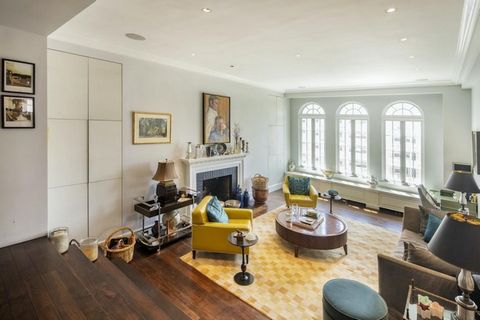 SIMPLY STUNNING SUNSHINE Apartment #99 gives the premier experience of a modern dream home situated atop one of Greenwich Village's most desirable full service pre-war cooperative buildings. A complete contemporary redesign by Messana O'Rorke goes ab...
