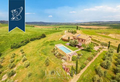 This prestigious farmhouse for sale is nestled in the rolling hills of Val d'Orcia near Siena, offering 280 sqm of bright interior space over two levels. Surrounded by a 1017-sqm garden with a panoramic infinity pool, the property includes a 900...