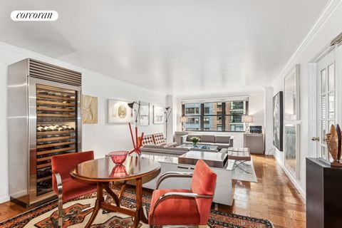 225 East 57th Street apartment 7G is a huge Two Bedroom two bath South facing home offering a highly desirable split bedroom layout with all UTILITIES INCLUDED in the maintenance! The oversized Living Room is so generous it can be used as both the Li...