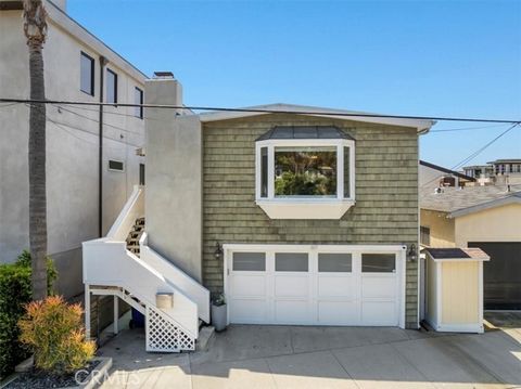 In the heart of the coveted Sand Section, this charming three-bedroom, two-bathroom home complete with modernized two-car garage exudes quintessential SoCal feel all while being surrounded by the best Manhattan Beach has to offer. Close proximity to ...