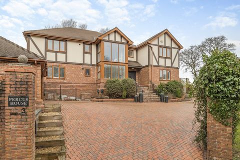 Percus House's modern interior is as attractive as its eye-catching mock-Tudor exterior. The front door leads into a large hall that extends into the first floor. An oak and glass staircase and a feature window on the first floor ensure this part of ...