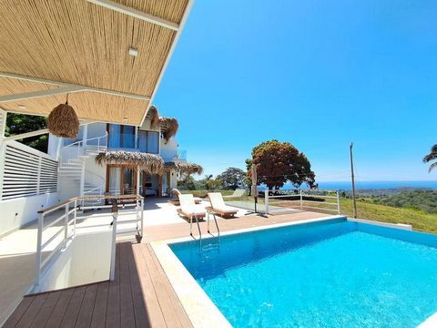 Discover this magnificent contemporary home with panoramic ocean views, nestled in the hills of Santo Domingo. Situated on a 1,002 m² (0.25-acre) lot, this exceptional residence offers 700 m² (7,535 sq. ft.) of luxurious living space across three lev...