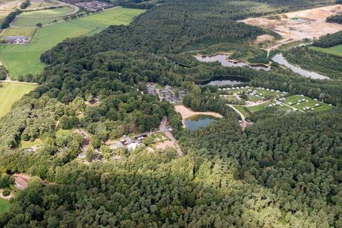 This comfortable chalet is located in the Resort Maasduinen, in an area with lots of water and nature, on the edge of the National Park of the same name. It is 12 km southwest of the city of Venlo and a stone's throw from the Dutch-German border. Thi...