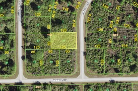 CLEARED! NEARLY QUARTER ACRE SINGLE FAMILY RESIDENTIAL LOT in SOUTH GULF COVE!! CITY WATER and SEWER!! South Gulf Cove boasts a wonderful community of newer homes with a park and a community boat launch for the lots that don't have their own canal ad...