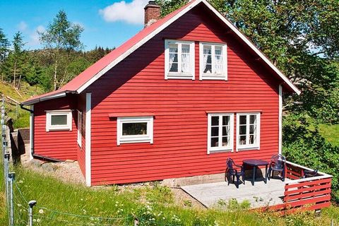 Holiday house in a rural setting in the middle of nature. The place for anyone who seeks peace and quiet. An attractive holiday resort for friends and family. The holiday home is bright and pleasantly decorated. In one living room there is a double s...
