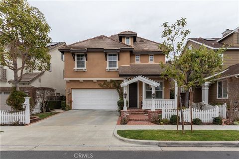 Welcome to 28 Sachem, a stunning Cape Cod style home nestled in the highly sought-after area of Ladera Ranch. Situated on a quiet cul de sac with no homes behind, this residence offers a serene retreat with its inviting front porch, perfect for enjoy...