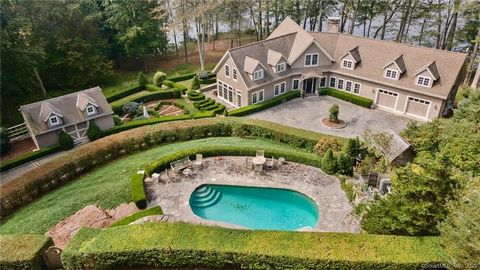 This superbly crafted 3,000 sq. ft. Contemporary Shingle style home sits privately on 1.94 acres with 320 feet of frontage on Hamburg Cove. Property features include an inground gunite pool with patio surround, documented dock, separate workshop buil...