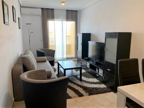 An apartment with an area of 82 m2 is for sale. The apartment has two bedrooms, one bathroom, a kitchen combined with a living room, and an entrance hall, which is not very common in Spanish apartments. From the living room there is access to the ter...