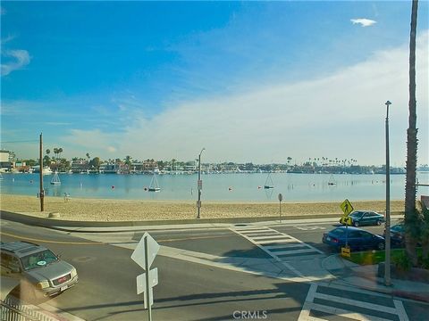 Wow, this waterfront property is absolutely amazing! With its prime location across from Alamitos Bay's sandy beaches, this Spanish building offers a unique opportunity with 2 bedrooms and 1 bath upstairs and 1 bedroom and 1 bath downstairs on the en...