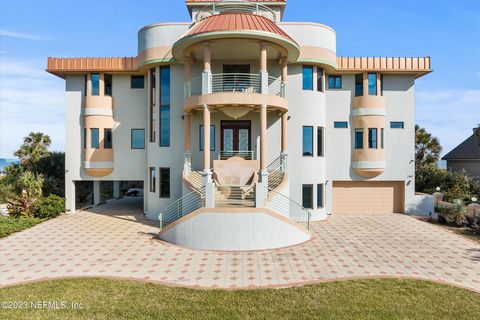 Blissful, beauty, Beach House with awing views of the vast Atlantic Ocean Coastline. Glass windows expand the entire east view capitalizing on the spectacular views of sand, blue skies and the deep blue sea. The large open spaces and high tray ceilin...