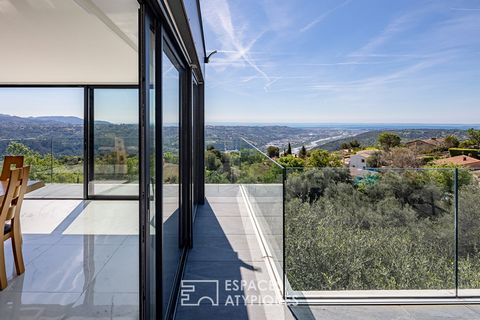 This neo-Provençal house of 240 m2 is located on a plot of 2820 m2 and dominates with its panoramic view the hills, the Var valley and the sea, from the heights of Gattières. Opened by large bay windows, the property is one with the vegetation and th...