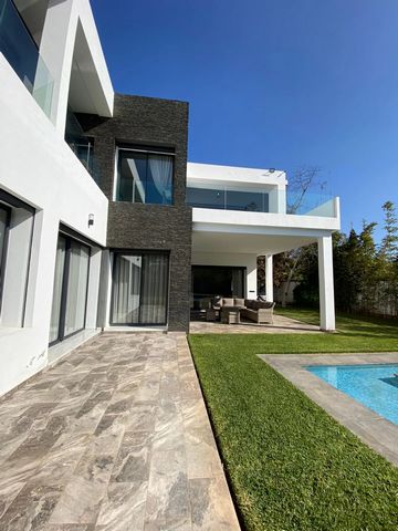 Located in Rabat. Modern luxury villa for rent in the heart of Souissi, close to the largest highways (Bani Ouaraine, Mehdi Ben Barka) Composed of 5 bedrooms and 4 bathrooms, it enjoys a superb south-east exposure. The villa has 2 living rooms overlo...