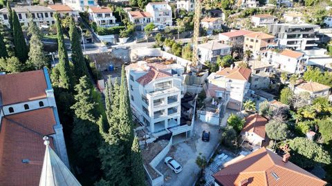 Location: Primorsko-goranska županija, Opatija, Opatija - Centar. A high-quality new building with 9 apartments was built in a prime location not far from the center and the beach. By car, you come directly to the garage, where there are spaces for e...