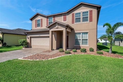 Welcome to this spacious home located in the Harrison Ranch of Parrish, Florida! Harrison Ranch is a premier community that boasts amenities, including a 24-hour fitness center, Heated Jr. Olympic swimming pool, billiards room, just over 5 miles of n...