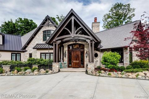 ONCE IN A LIFETIME OPPORTUNITY - EXQUISITE ESTATE WITH GAME RANCH Uniquely positioned in Southern Michigan, just 25 minutes from Ann Arbor, and 2.5 miles from a major highway, this completely fenced and gated 202 acre property is a hunting enthusiast...