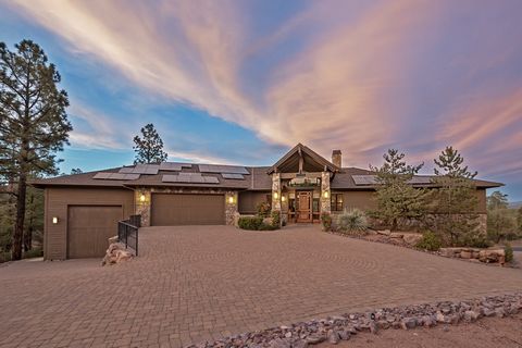Rare find and turnkey including a Grand piano that welcomes you to this remarkable mountain retreat, boasting an impressive entryway with a custom stained-glass window and water feature. The great room captures attention with its soaring vaulted ceil...