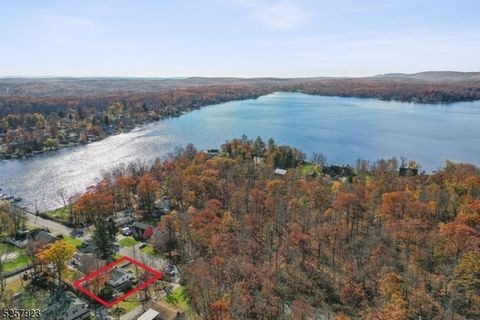 Cozy Fully Renovated 2 Bedroom 1 Bathroom Ranch literally across the street from highly sought out Culver Lake with lake views. Enjoy lake living with a desirable floor plan and toasty fireplace. Privacy meets serenity with this home's large backyard...