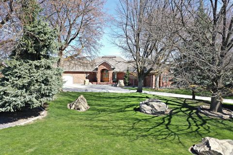 RIM Views out every window! This Luxury Estate Property looks out over the Boise River Valley. Situated is a tranquil park-like setting, this stunning, timeless, solid brick home with a tile roof and matching RV shop/garage will delight you. Immacula...