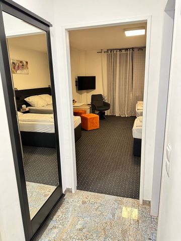 Welcome to our friendly luxury apartment. The apartment offers sufficient space for up to four people and has the following Equipment: - A bedroom with a double bed, two single beds, a closet, a dining table with stools, a TV, free Wi-Fi internet acc...