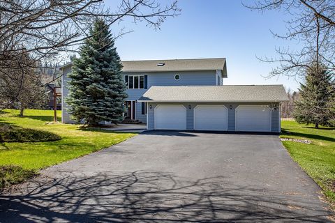 Need living space?? Almost 5,000 sq ft finished living area. Grant Creek home on 1.096 acres, UG sprinklers, asphalt drive, views, backs to ranch land. 3 car att. garage. Main floor has living room/dining combination with built in wall of cabinetry. ...