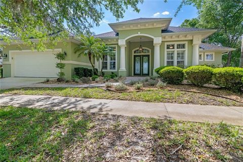 Welcome to luxury living in the Grand Haven Community of Palm Coast! This stunning 4-bedroom, 3-bathroom pool home and newer roof (2022) is sure to captivate you from the moment you step inside. As you enter, you'll be greeted by tray and coffered ce...