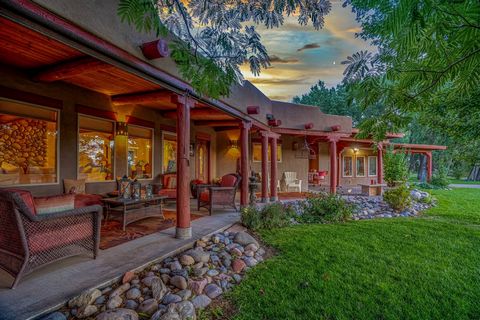 Hidden amongst the cottonwoods, +/- 27 miles south of Durango Colorado, lies the secluded and serene +/- 17.5 acres of the Animas River Paradise. The centerpiece of this private end of the road oasis is the + - 4000 sq ft, 3b/3b, Santa Fe style home ...