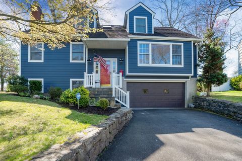 This lovely Colonial sits on a quiet cul-de-sac with a completely private Brazilian wood deck with a natural rock waterfall and Bose surround system, perfect for entertaining. The chef's kitchen features granite countertops, a double oven, and built-...
