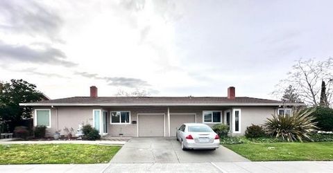 Dont miss this rare opportunity to own a DUPLEX with TWO 3 Bedroom / 2 Bathroom homes - near Main Street Cupertino and Creekside Park! Consider the possibilities: (1) Live in one and rent out the other for extra income. (2) Rent out both sides to max...