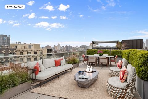 Step inside this loft like 4-Bedroom/2 Bathroom southeast facing apartment with a private 627sqft roof terrace. Enter into this stunning 1,912sqft apartment and you will be greeted by floor to ceiling windows in every room. To the left is an open che...