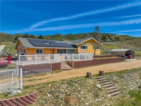 Breathtaking views of Leona Valley can be yours! Situated on approximately 2.5 acre lot. This 3 large bedroom and 2 bath home has a open concept living area that is just over 2,200 square feet. The laundry area has a closet and is currently being use...