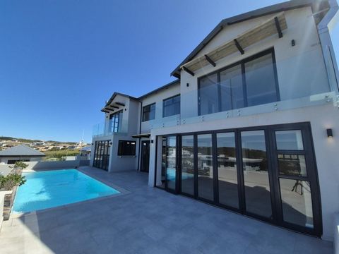 This stunning home offers the ultimate in secure estate living along South Africa's breathtaking Garden Route. Designed to maximise panoramic views of the Robberg Nature Reserve, the Indian Ocean, and the majestic Tsitsikamma Mountains, this property...