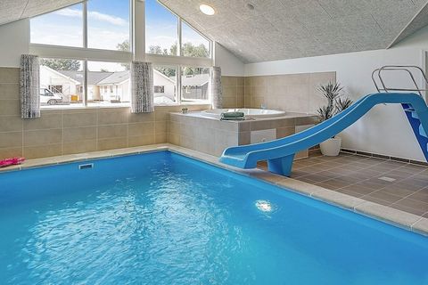 In this activity and wellness cottage you can enjoy the 18 m2 large swimming pool with counter-current system and water slide right from the morning. Afterwards, you can relax in the hot tub and sauna and recharge your body. Ready for today's challen...