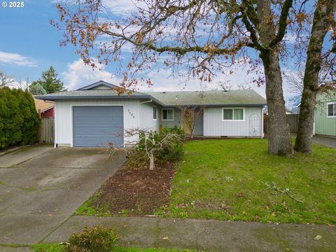 This inviting home features an open-concept living space, anchored by a bright living room with a cozy, energy-efficient woodstove that can heat the entire house if desired. Enjoy seamless access to the deck and fenced backyard, where you can take in...