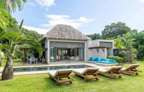 Gadait International presents an exceptional villa nestled in the heart of the prestigious Anahita Golf Resort on the east coast of Mauritius. Situated on a 1,013 m² plot facing the 9th hole of Ernie Els' famous course, this property combines the cha...