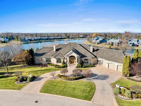 Stunning, elegant, waterfront, luxury, brick estate opportunity in Green Bay WI.Nestled in on 3 Lake Largo lots (1.53 acres) w/ 387? of shoreline this residence has over $8, 000, 000 invested into its creation. Pella architectural windows, travertine...