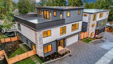 Experience the epitome of Kirkland living in The Adams, a stunning new residence by Chaffey Building Group. This luxurious home in The Houghton Collection boasts high-end finishes, a versatile 1st floor guest suite perfect for multi-generational livi...