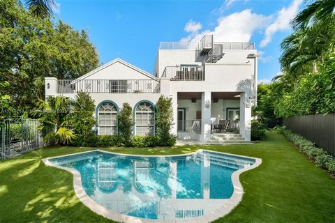 Set on a coveted 9,272 SF corner lot in the heart of the Venetian Islands, this stunning residence seamlessly blends modern luxury w/ effortless island living. Renovated, turn-key residence features 5BD, 4.5 BA. The home boasts soaring double-height ...