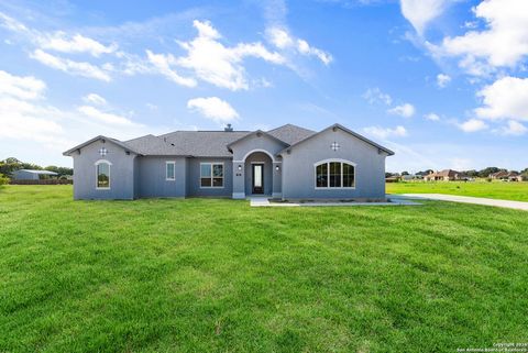 ***Ask about the builder's Flex Cash Rate Buydown incentive!***Welcome to this stunning single-story Texas Home in Floresville, featuring three bedrooms and a charming stucco exterior with a side-entry garage. Inside, you'll find luxurious LVP floori...