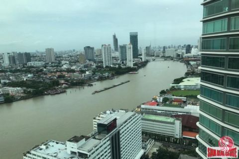 Sensational views of the Chao Phraya River from this three bedroom, four bath condo in the Menam Residence. Located on the 28th floor, the river is seen from almost every room. There is a large open living space that includes the living room and dini...