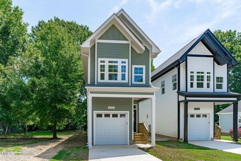 Mindfully designed newly constructed home is nestled in the heart of Durham where modern living meets urban convenience! As you step into this two-story abode, you are greeted with sweeping 10 ft high ceilings and trending model finishes that maximiz...