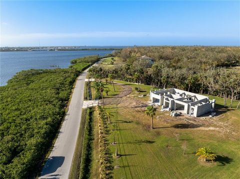 Welcome home to your rare oasis on Terra Ceia Island, offering 2.5 acres of serene beauty with over 454 feet of waterfront and the potential for your own private dock. This exceptional property is a boater’s paradise, with only one bridge to open wat...