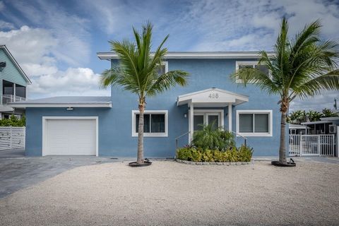 Island Elegance and Open Water Access with Bonuses! Wake up to ocean breezes, endless sunshine, and the sound of gentle wavesthis turn-key waterfront retreat in Marathon is your ticket to island living! Whether you're seeking a laid-back second home,...