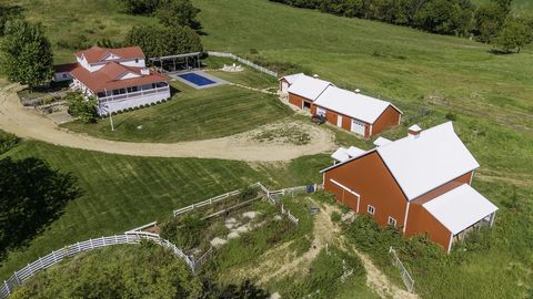 Welcome to Sweet Freedom Ranch, a stunning 180-acre retreat in Elizabeth Township, IL. Designed by Nate Dressler of Galena Hillside Homes, this fully renovated (2019) turnkey, single-family estate features 5 bedrooms, 4.1 baths, and sleeps 20. The op...