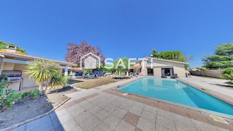 Maison familiale avec piscine, prestations haut de gamme et jardin paysager