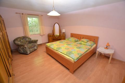 This spacious 4-bedroom holiday home can accommodate up to 8 people, especially families with children. Located near the Ski area, in Klokocí, it is nicely furnished with free WiFi and a private garden. This home is very near to a forest and there ar...