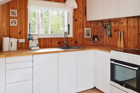 In the middle of the forest by Bjerge Sydstrand is this completely renovated cottage on a large, secluded plot. The house contains three good bedrooms, a large living room in connection with the kitchen and a nice bathroom. Large, partially covered t...