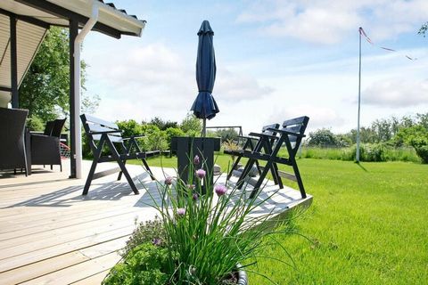 This holiday cottage is close to a family friendly beach at the end of a cul-de-sac, and nearby a protected nature area with a rich wildlife. The living room has a great inflow of light and view of nature, and access to the covered terrace where you ...